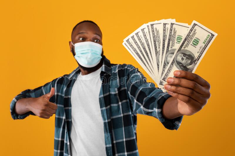 Black guy holding dollar